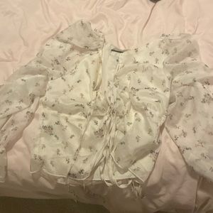 Floral summer long sleeved top. (See through on arms)